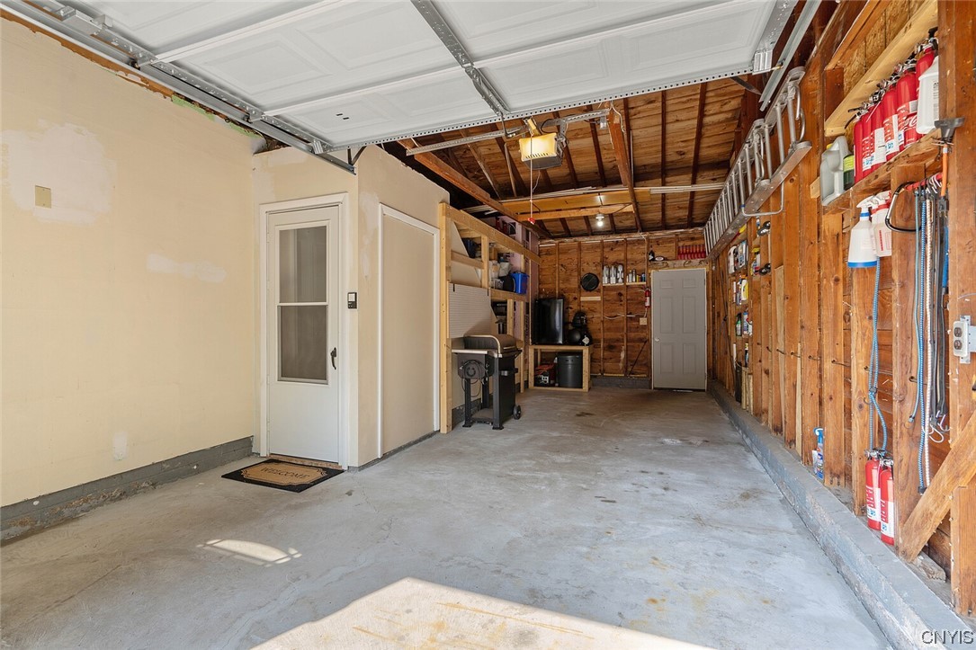 47 Macarthur Road Lysander, NY 13027 - Photo 31 of 34 One car garage offers extra storage