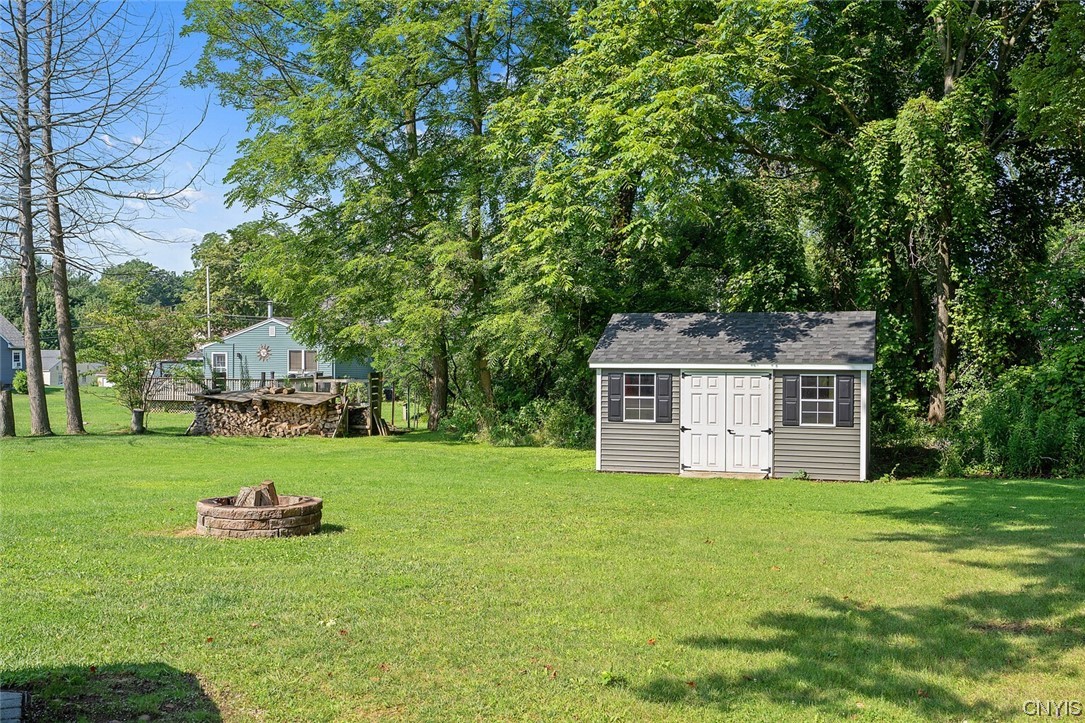 47 Macarthur Road Lysander, NY 13027 - Photo 32 of 34 Shed for all of your outdoor equipment and firepit