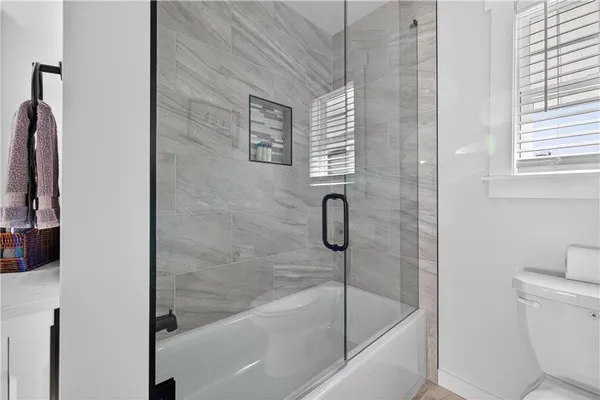 a view of a swimming pool with a yard