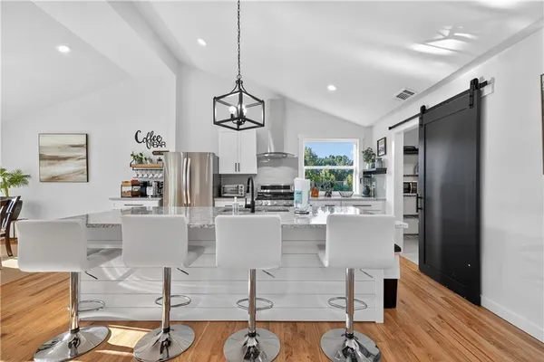 a front view of a room with storage and utility