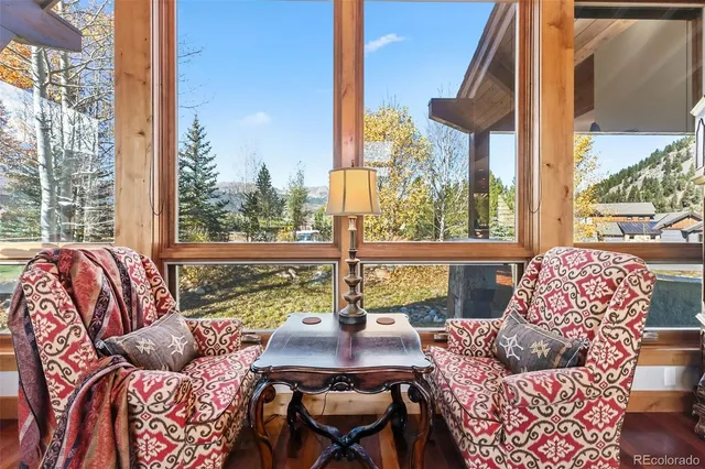 a living room with large windows