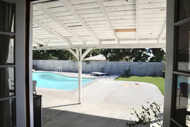 a view of backyard and porch