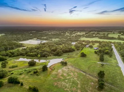 a view of an ocean and a yard