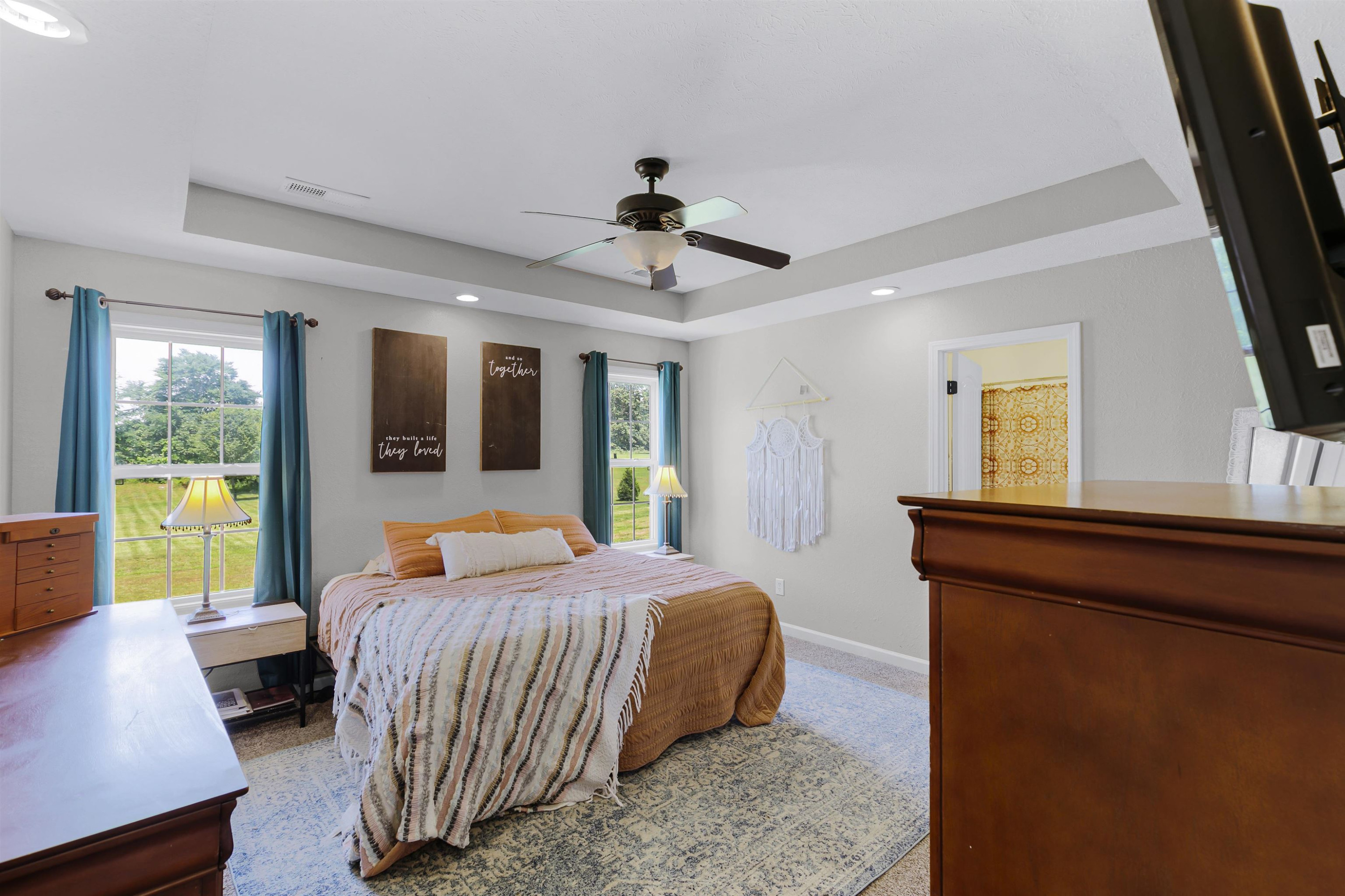 740 Corson Road Henderson, TN 38340 - Photo 11 of 15 a bedroom with a large bed and a window
