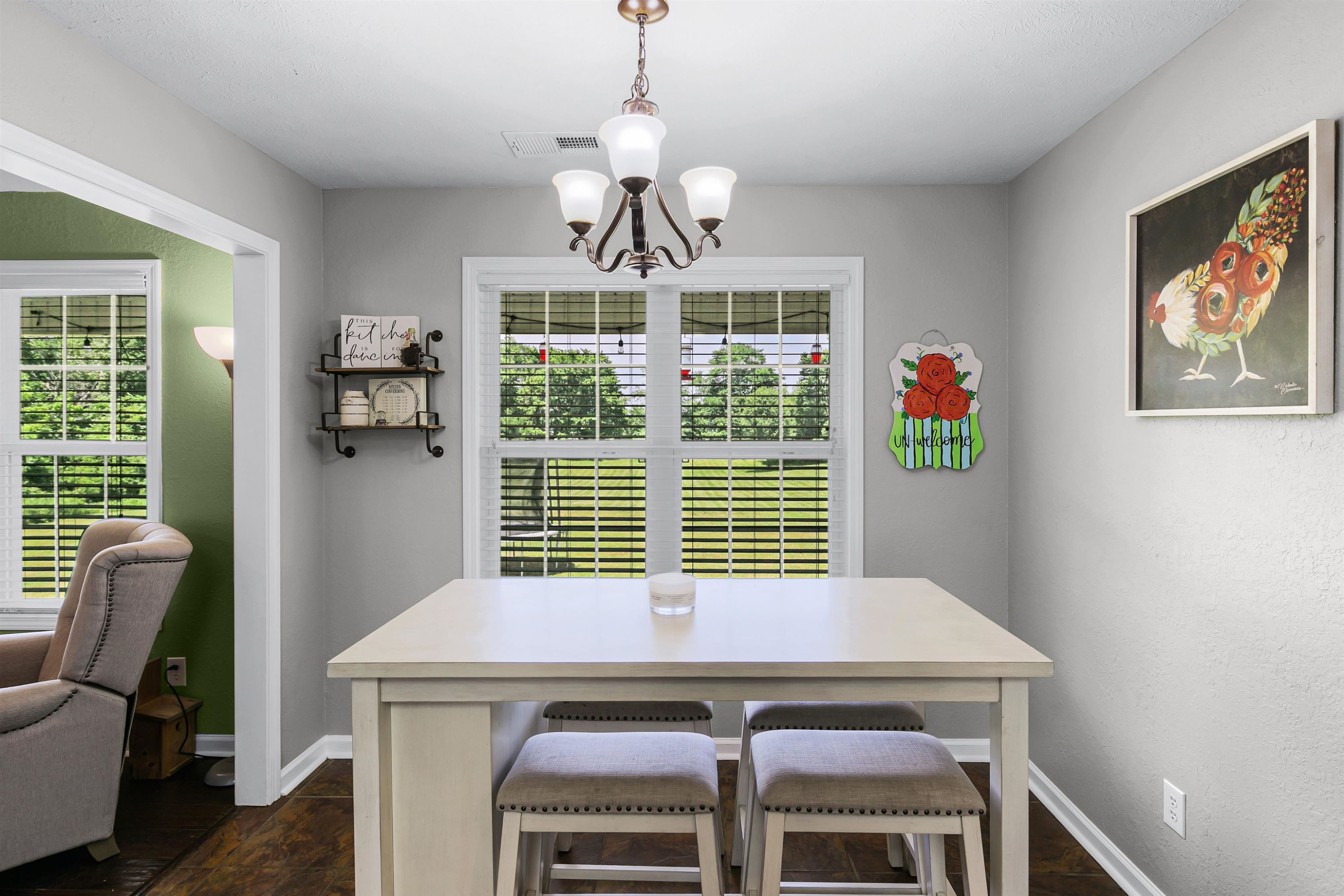 740 Corson Road Henderson, TN 38340 - Photo 10 of 15 a view of a dining room with furniture window and wooden floor