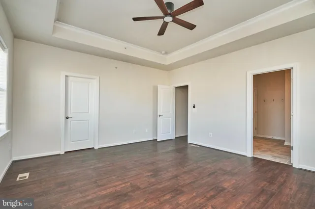 a bathroom with a double vanity sink mirror and