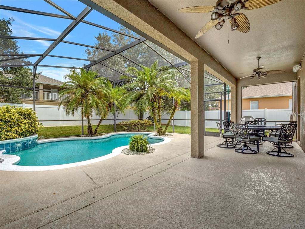10023 Ians Ridge Road Orlando, FL 32832 - Photo 42 of 60 a view of a porch with furniture