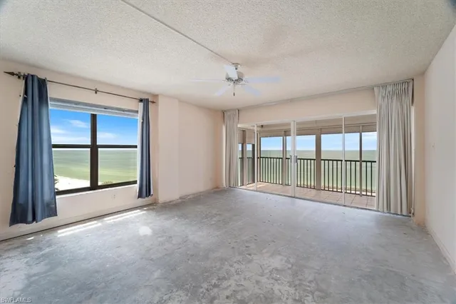 a spacious bathroom with a sink a toilet a mirror a vanity and shower
