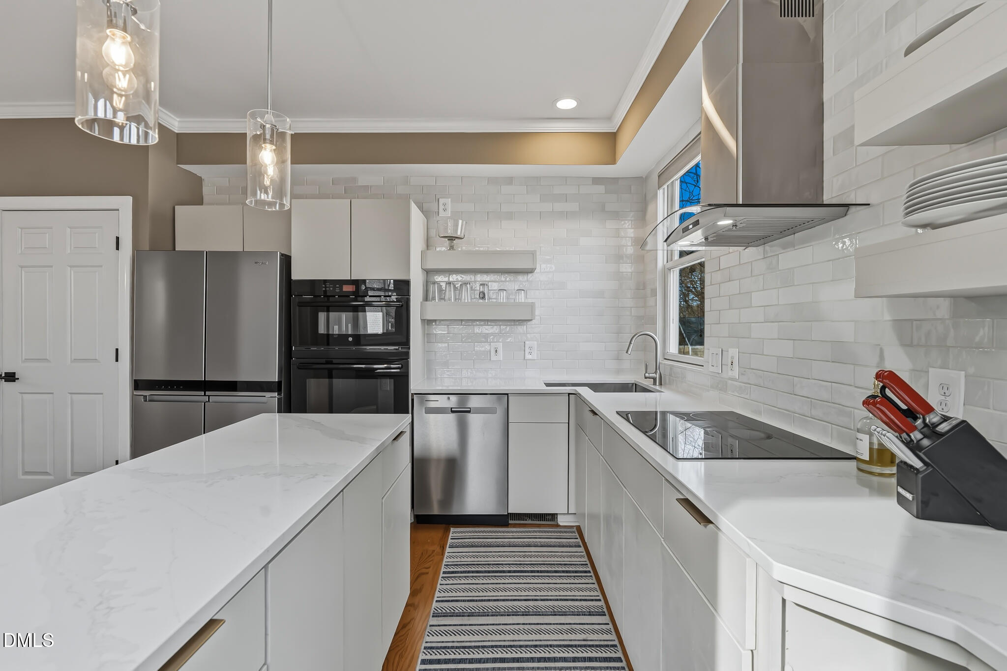 204 Georgetown Road Raleigh, NC 27608 - Photo 32 of 66 a kitchen that has a sink and a stove