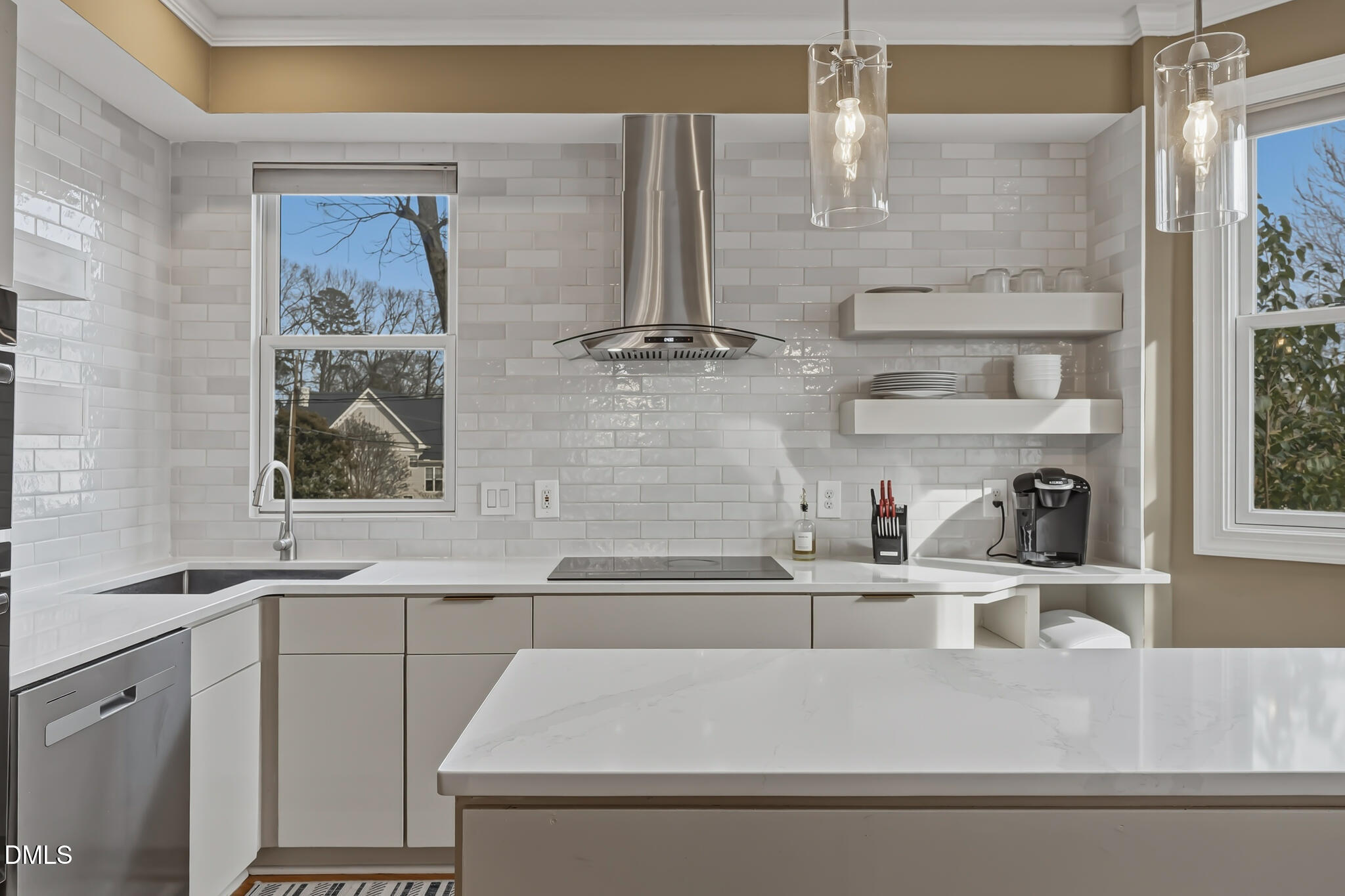 204 Georgetown Road Raleigh, NC 27608 - Photo 35 of 66 a kitchen with a sink and a window