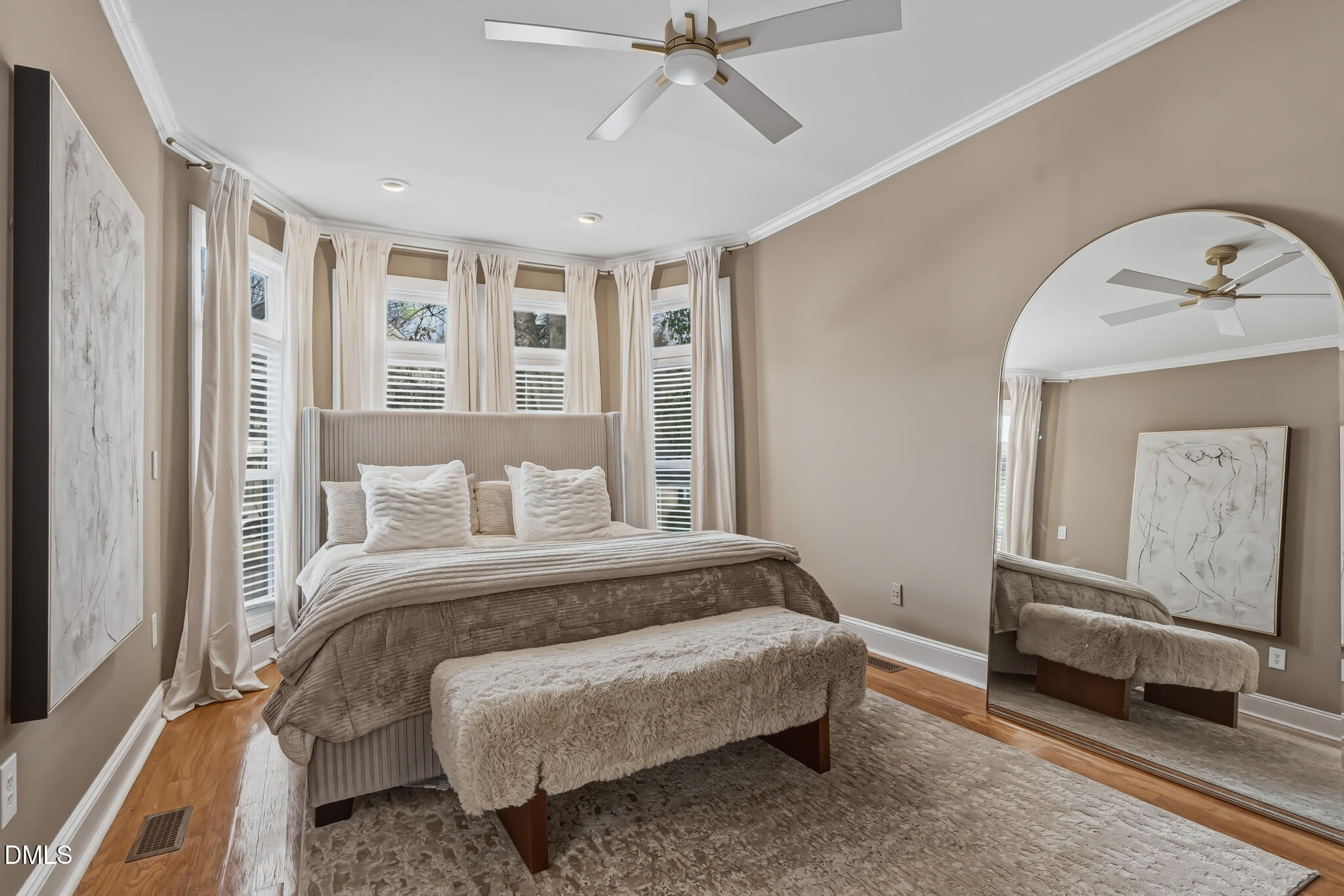 204 Georgetown Road Raleigh, NC 27608 - Photo 38 of 66 a bedroom with a bed and a chandelier