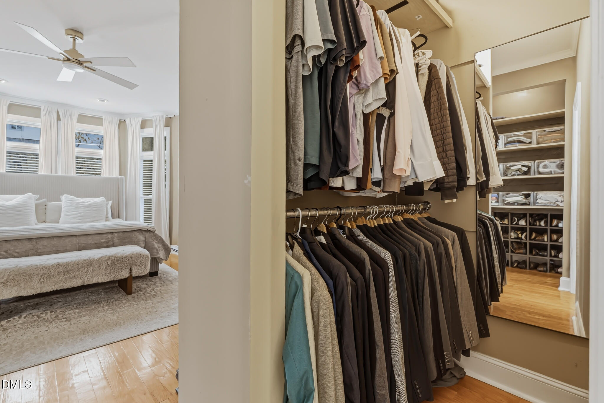 204 Georgetown Road Raleigh, NC 27608 - Photo 43 of 66 a view of walk in closet with clothes and shoes