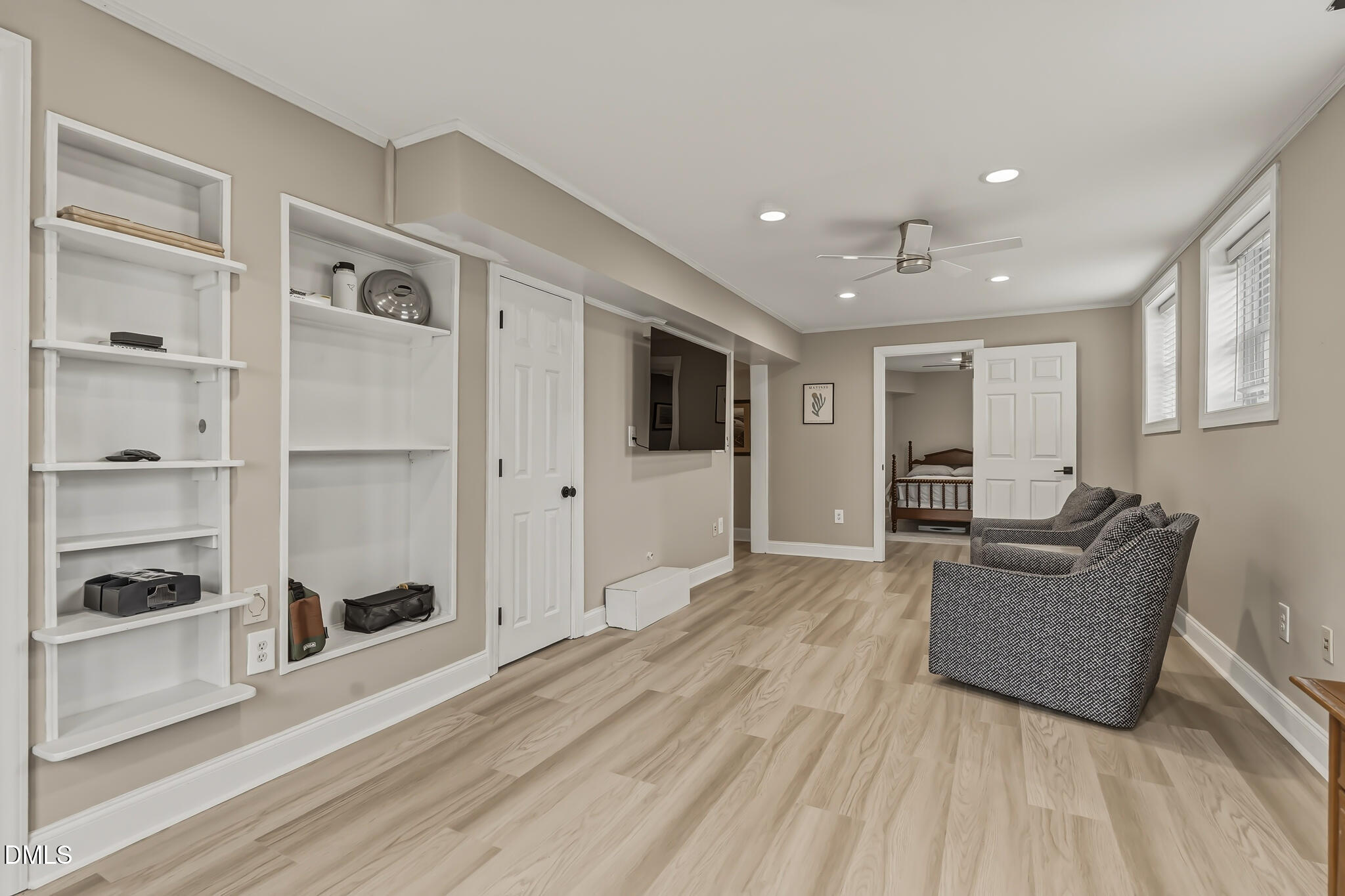 204 Georgetown Road Raleigh, NC 27608 - Photo 58 of 66 a living room with furniture and a flat screen tv