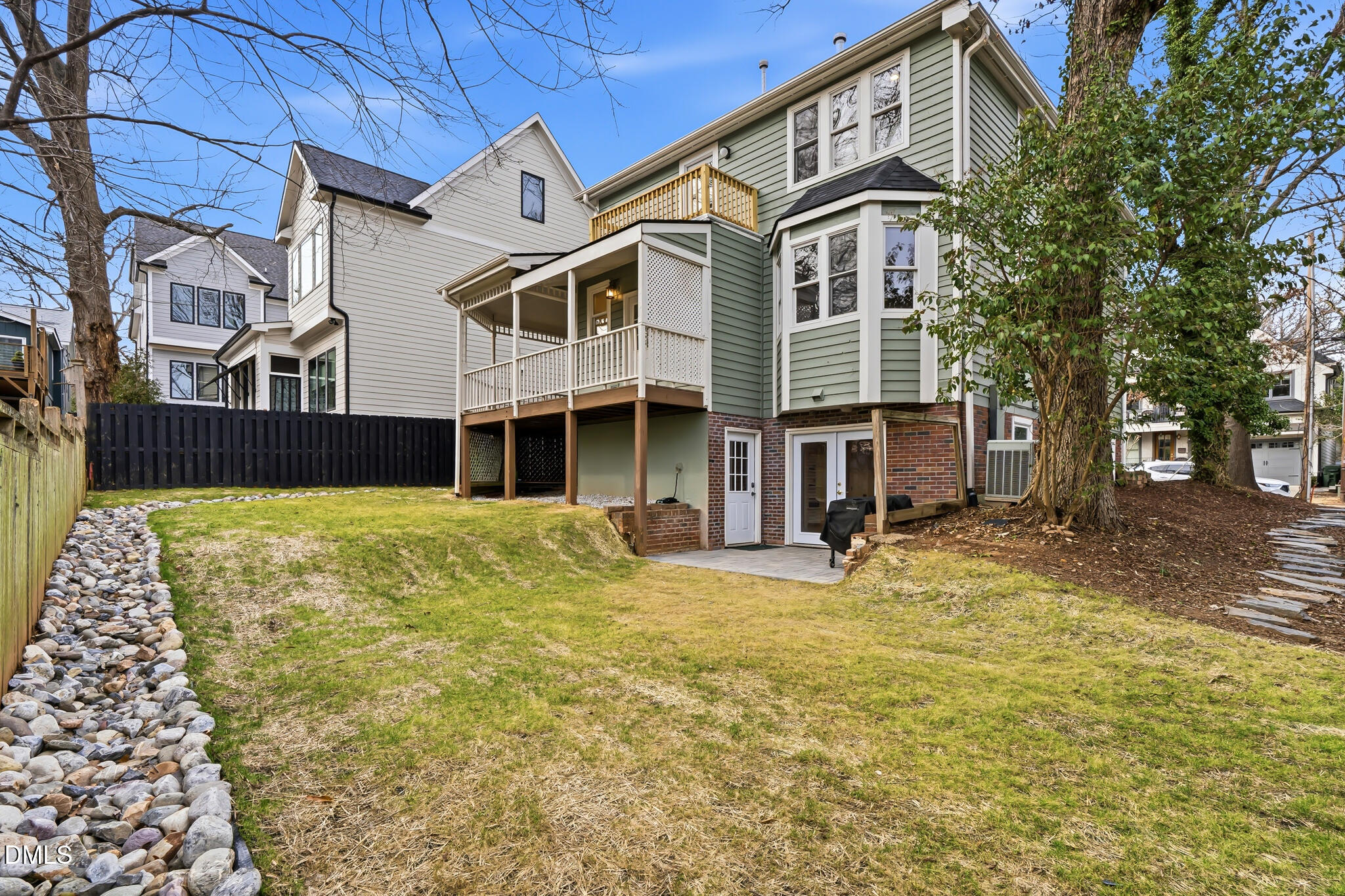 204 Georgetown Road Raleigh, NC 27608 - Photo 62 of 66 a view of a house with a yard