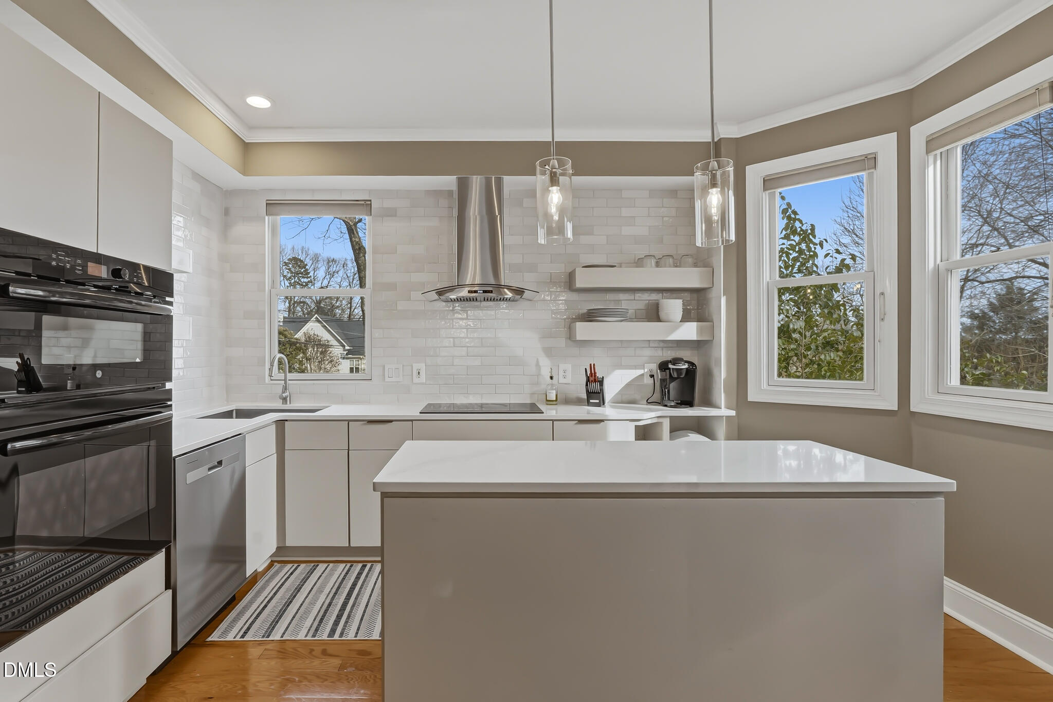 204 Georgetown Road Raleigh, NC 27608 - Photo 8 of 66 a kitchen with stainless steel appliances granite countertop a sink stove and refrigerator