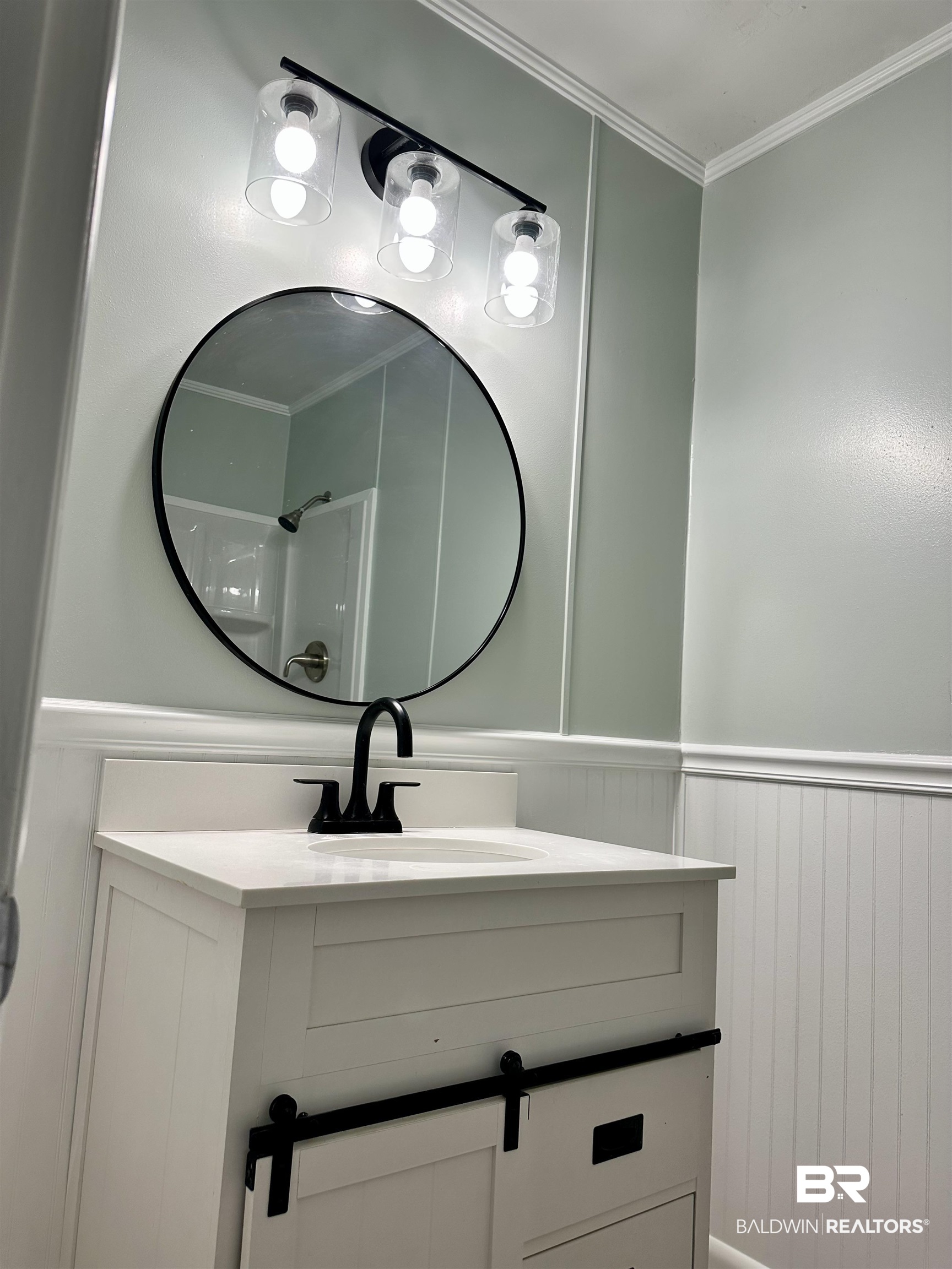 103 Avalon Street Brewton, AL 36426 - Photo 6 of 14 Bathroom featuring vanity, walk in shower, and ornamental molding