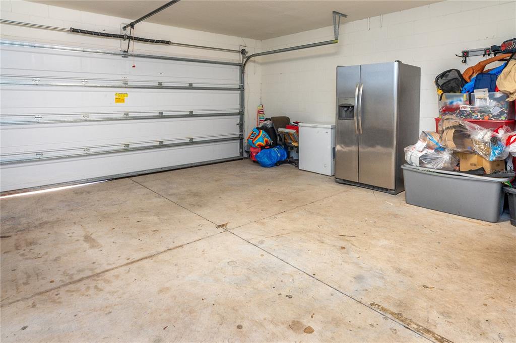 4563 Orchard Grove Road St. Cloud, FL 34772 - Photo 29 of 51 a view of storage and utility room with empty racks