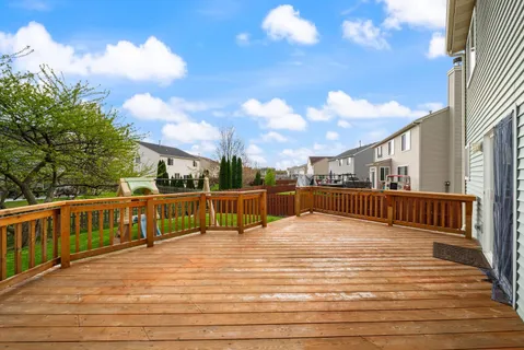 a view of swimming pool with deck and outdoor seating
