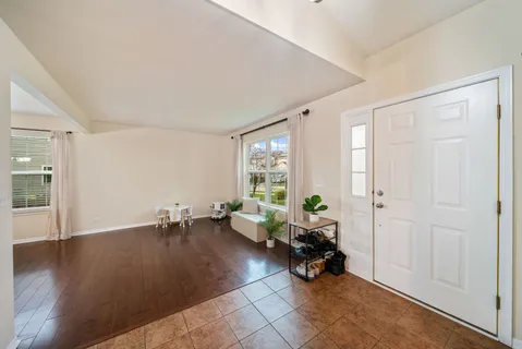 wooden floor to ceiling window and hardwood floor