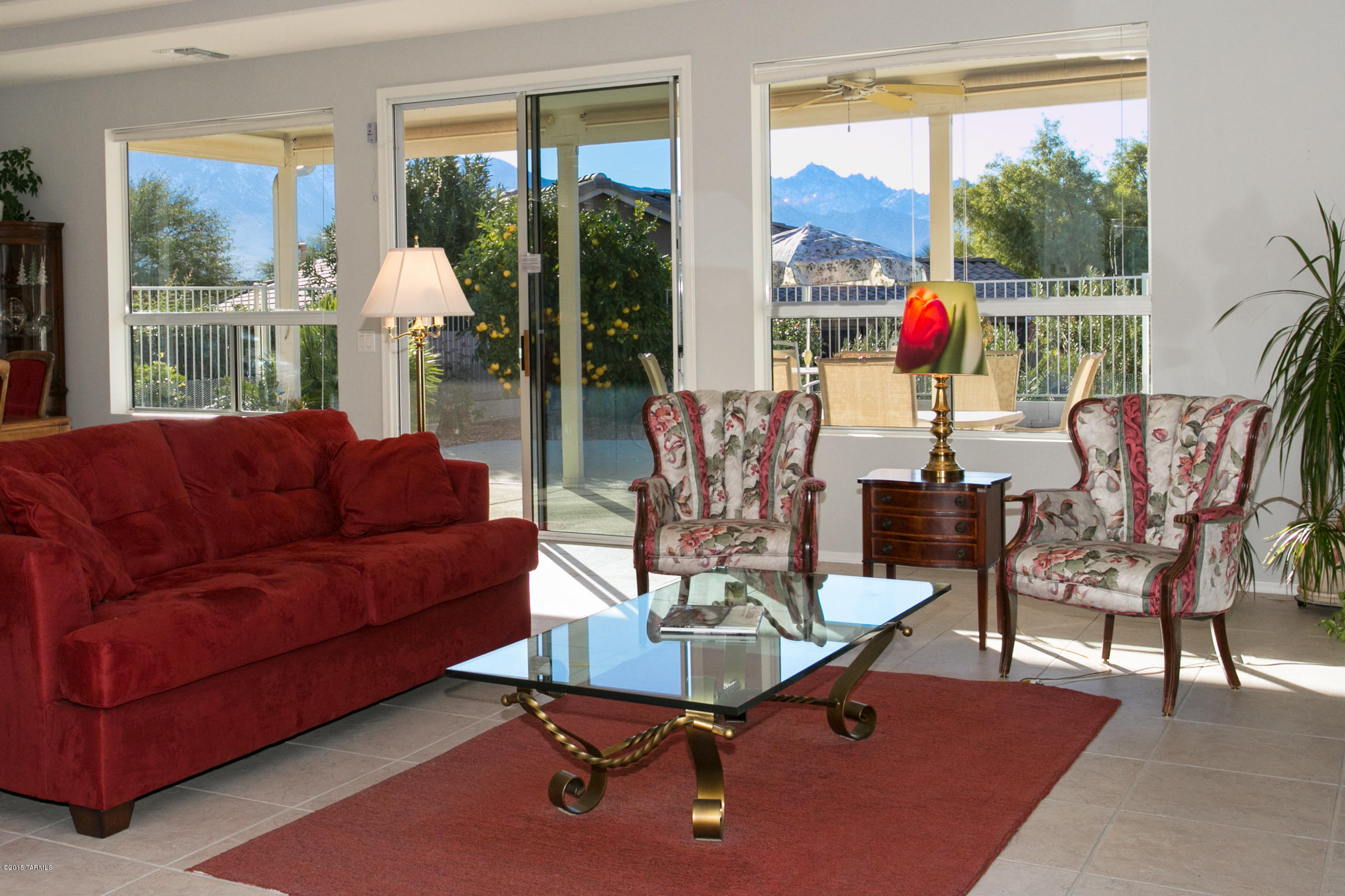 62419 East Northwood Road Tucson, AZ 85739 - Photo 13 of 30 a living room with furniture and a large window