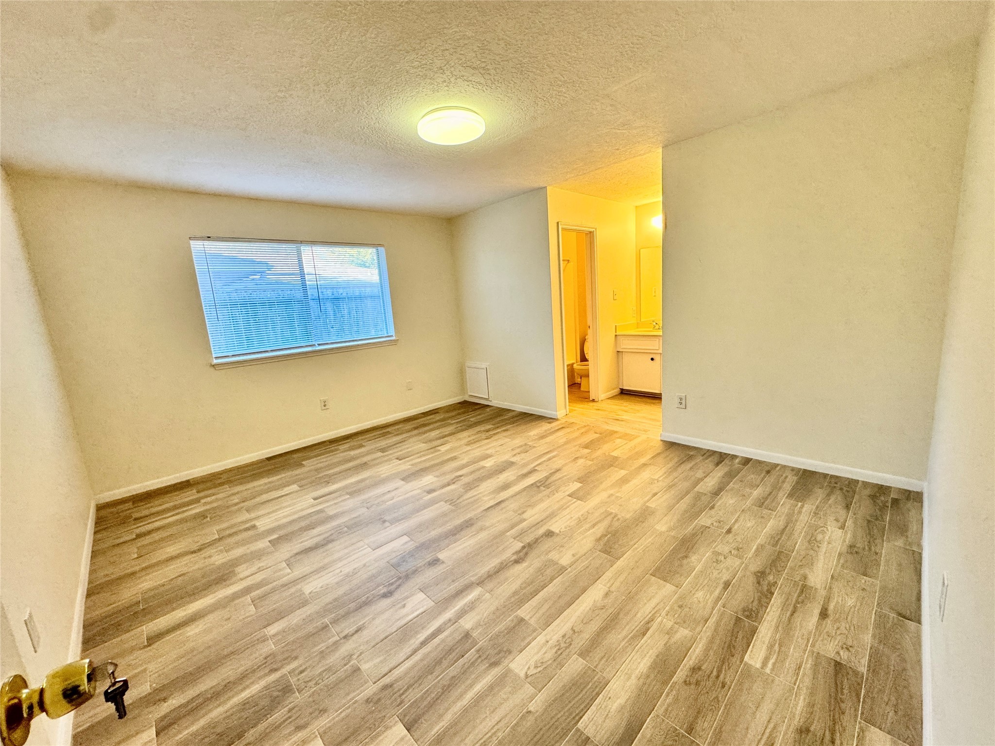 22306 Waynoka Road Katy, TX 77450 - Photo 14 of 21 a view of an empty room and window