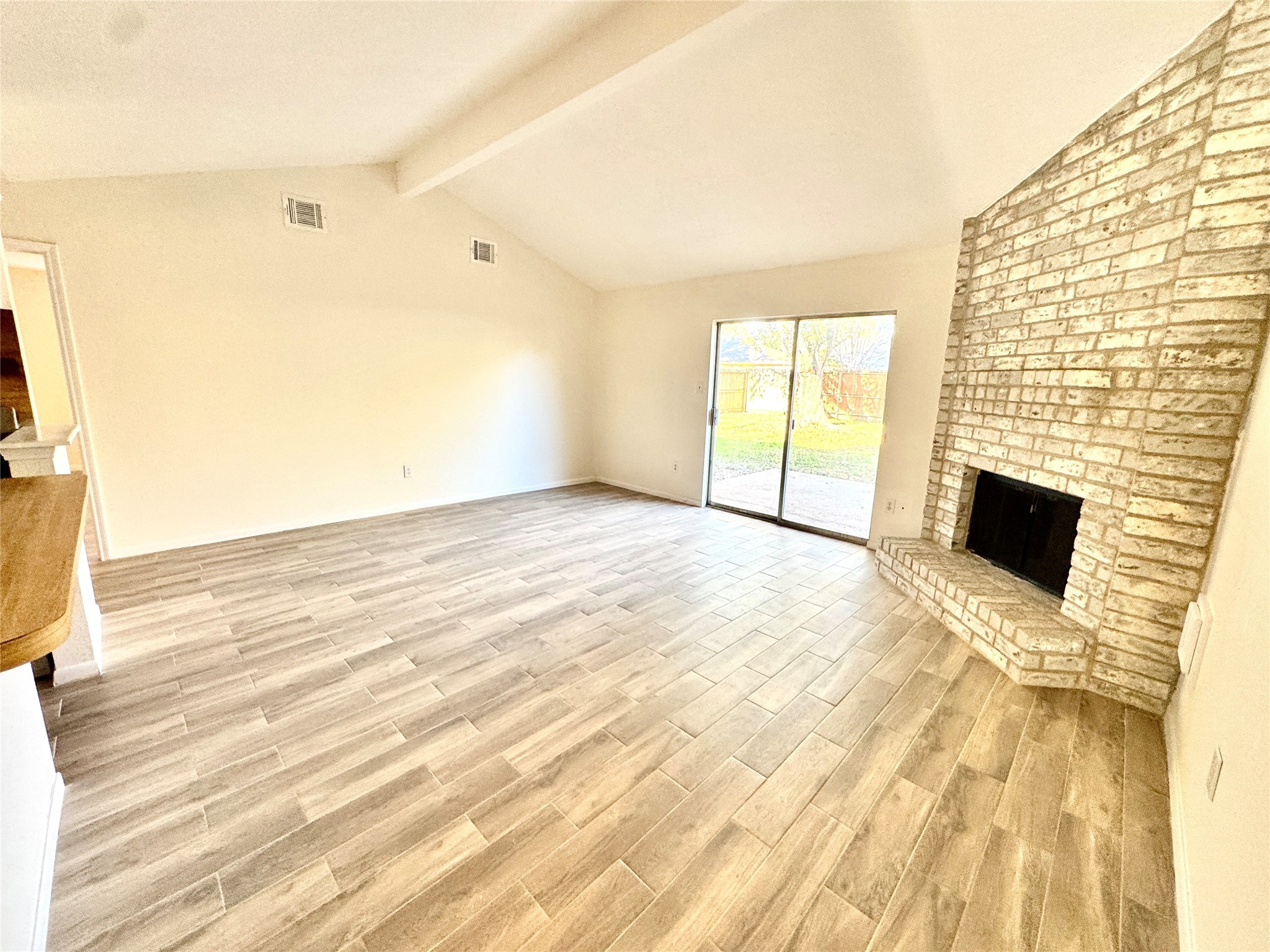 22306 Waynoka Road Katy, TX 77450 - Photo 5 of 21 a view of empty room with wooden floor and fan