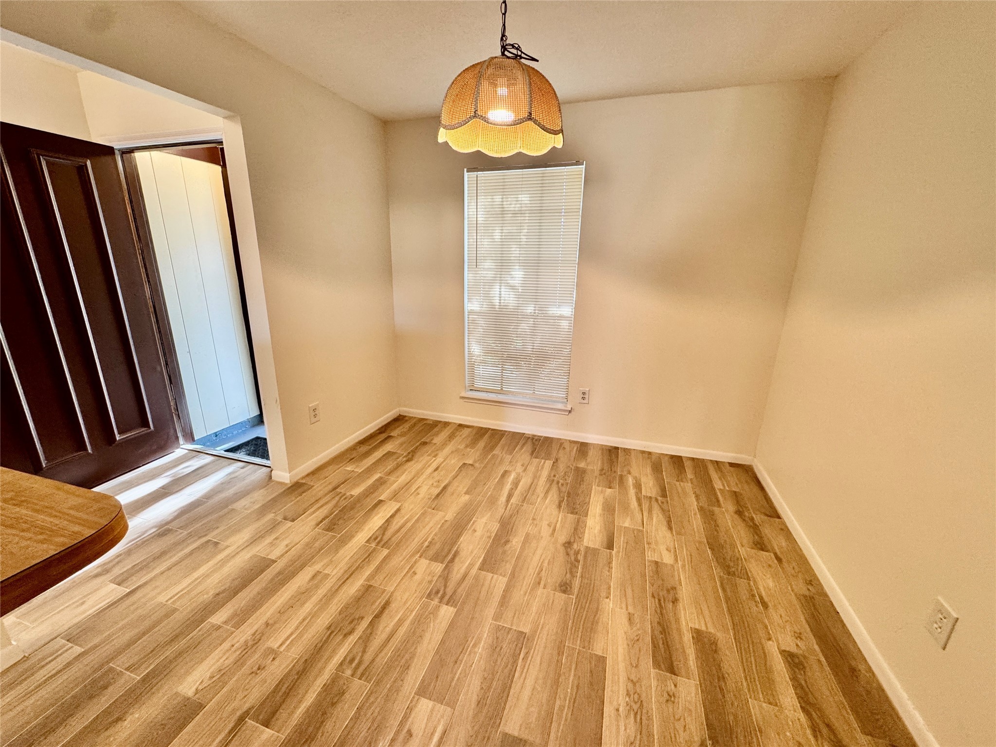 22306 Waynoka Road Katy, TX 77450 - Photo 10 of 21 a view of empty room with wooden floor and fan