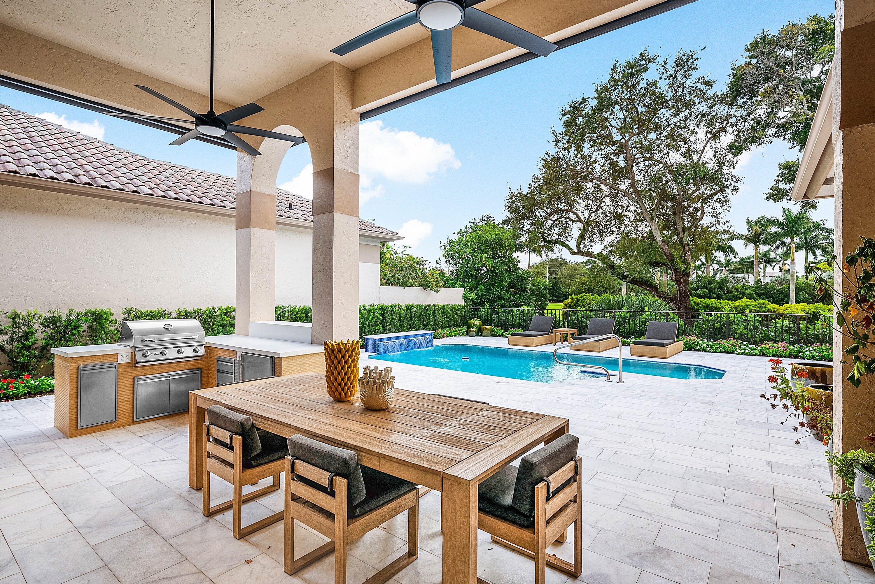 2370 Northwest 53rd Street Boca Raton, FL 33496 - Photo 31 of 42 Covered Patio fully open