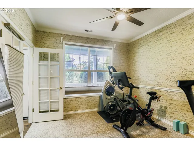 a view of a livingroom with furniture and a window
