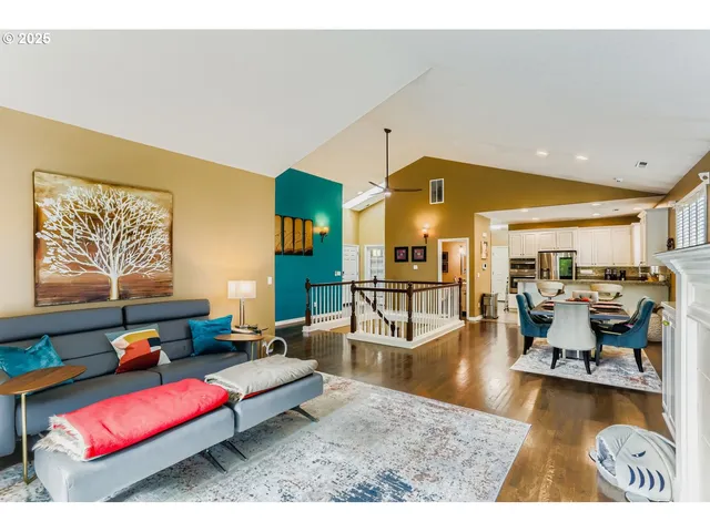 a living room with furniture and a table