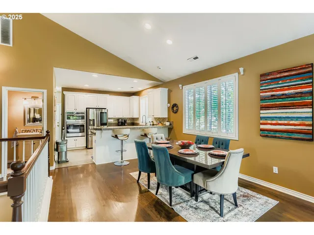 a outdoor dining space with furniture and a potted plant