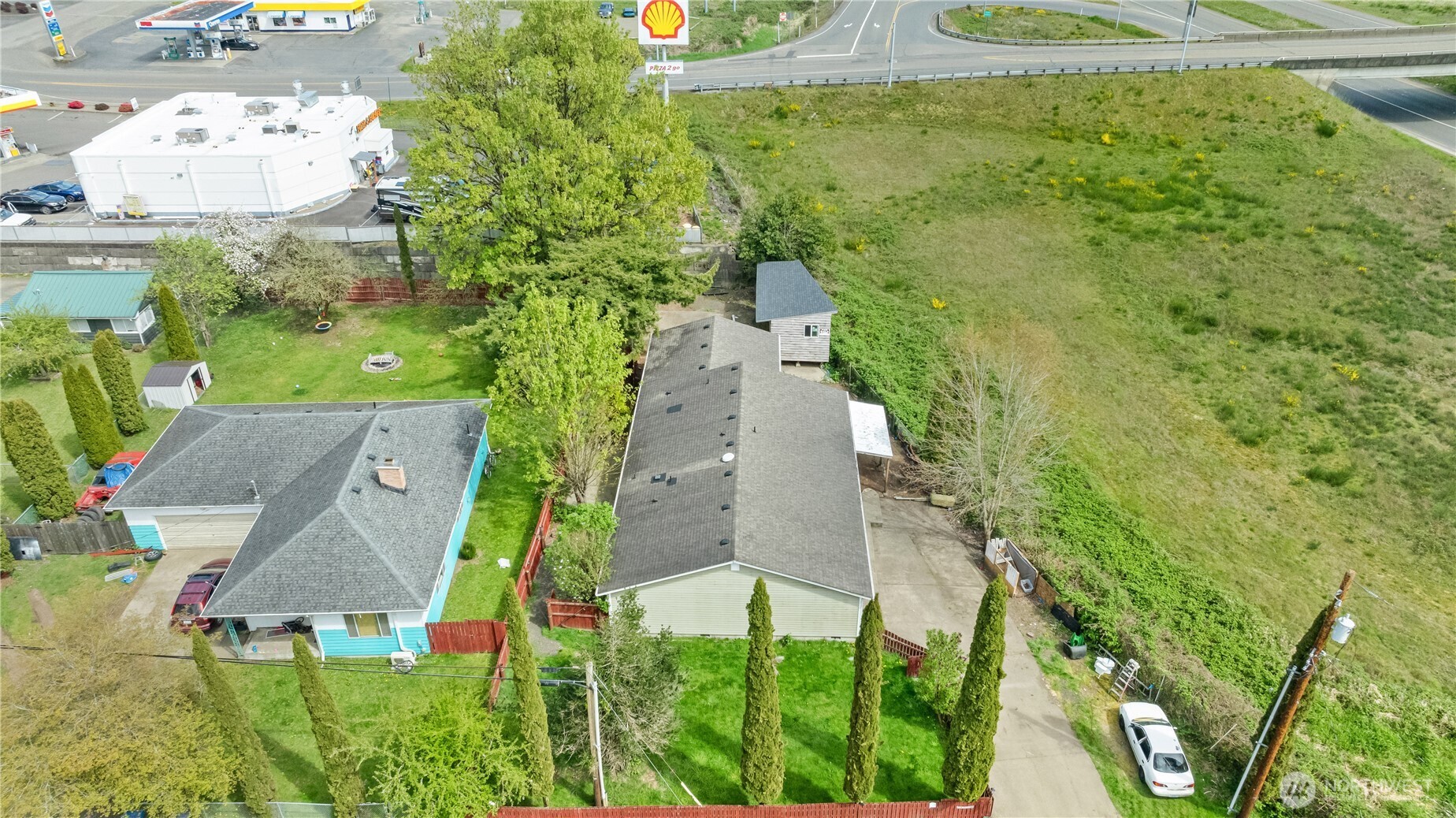 320 South 4th Street Elma, WA 98541 - Photo 28 of 35 an aerial view of a house with a yard
