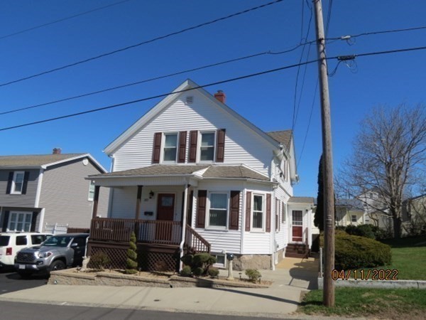 a front view of a house with yard