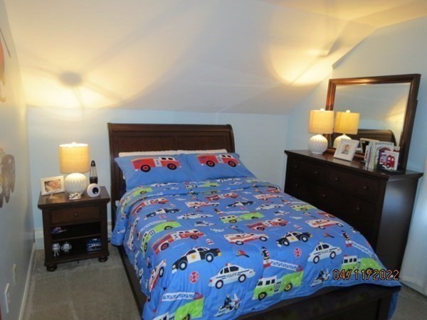 312 America Street Fall River, MA 02721 - Photo 12 of 26 a bedroom with a bed and window