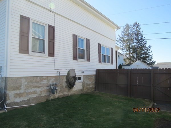 312 America Street Fall River, MA 02721 - Photo 26 of 26 a view of a house with a yard