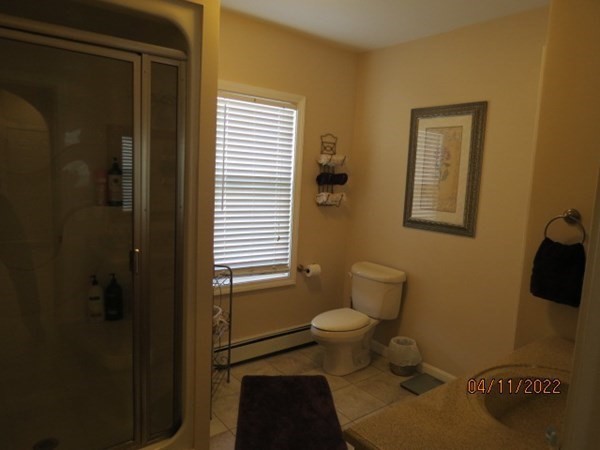 312 America Street Fall River, MA 02721 - Photo 8 of 26 a bathroom with a toilet and a shower