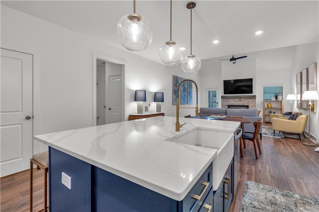 50 Puckett Road Emerson, GA 30137 - Photo 12 of 26 a large kitchen with a table and chairs