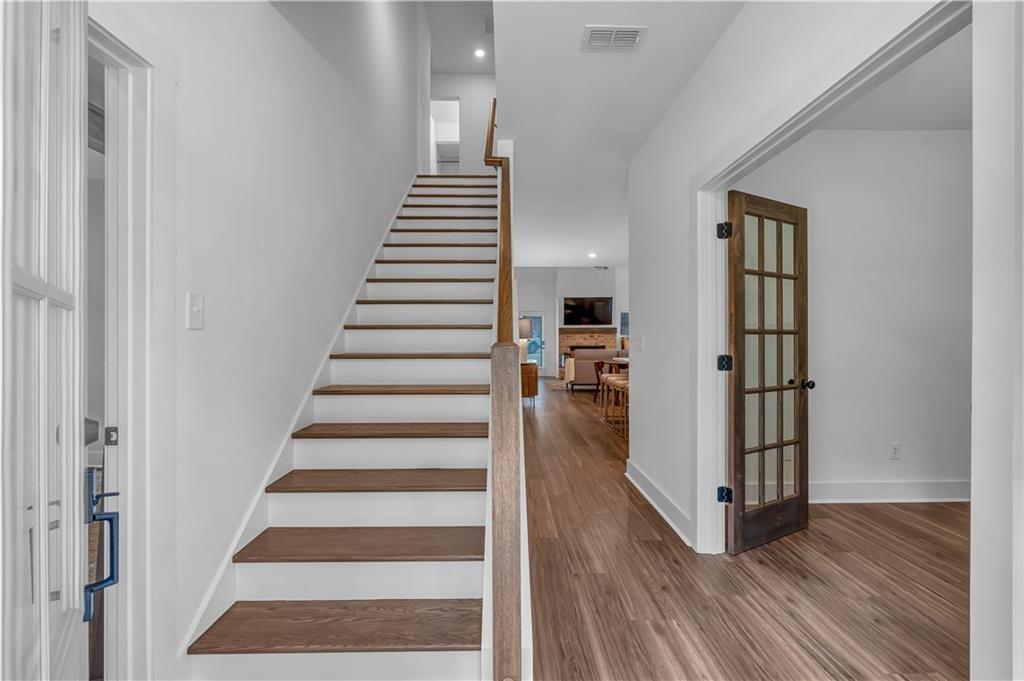 50 Puckett Road Emerson, GA 30137 - Photo 3 of 26 a view of entryway with wooden floor and stairs
