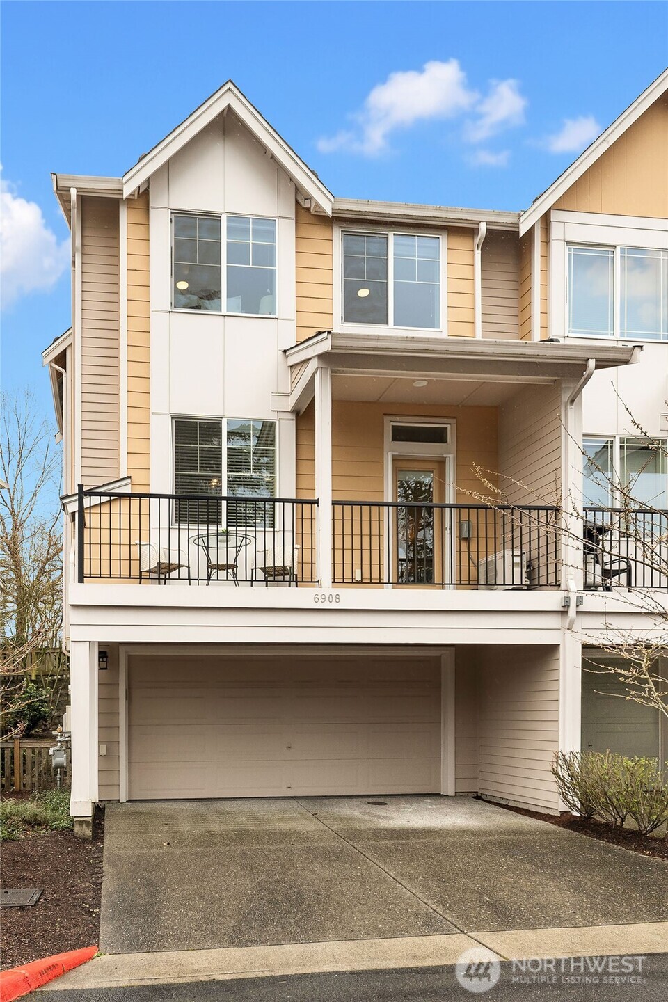 6908 31st Avenue Southwest Seattle, WA 98126 - Photo 30 of 33 a front view of a house with windows
