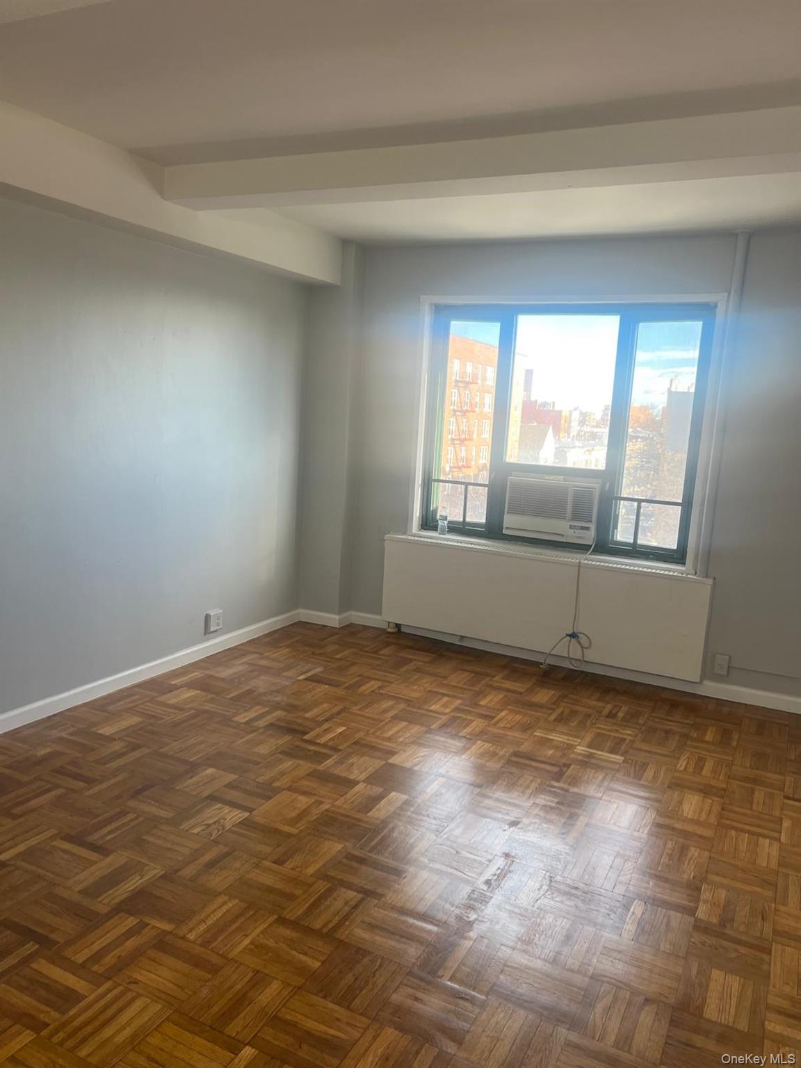 1314 Virginia Avenue, Unit 4F Bronx, NY 10462 - Photo 11 of 17 Empty room featuring baseboards