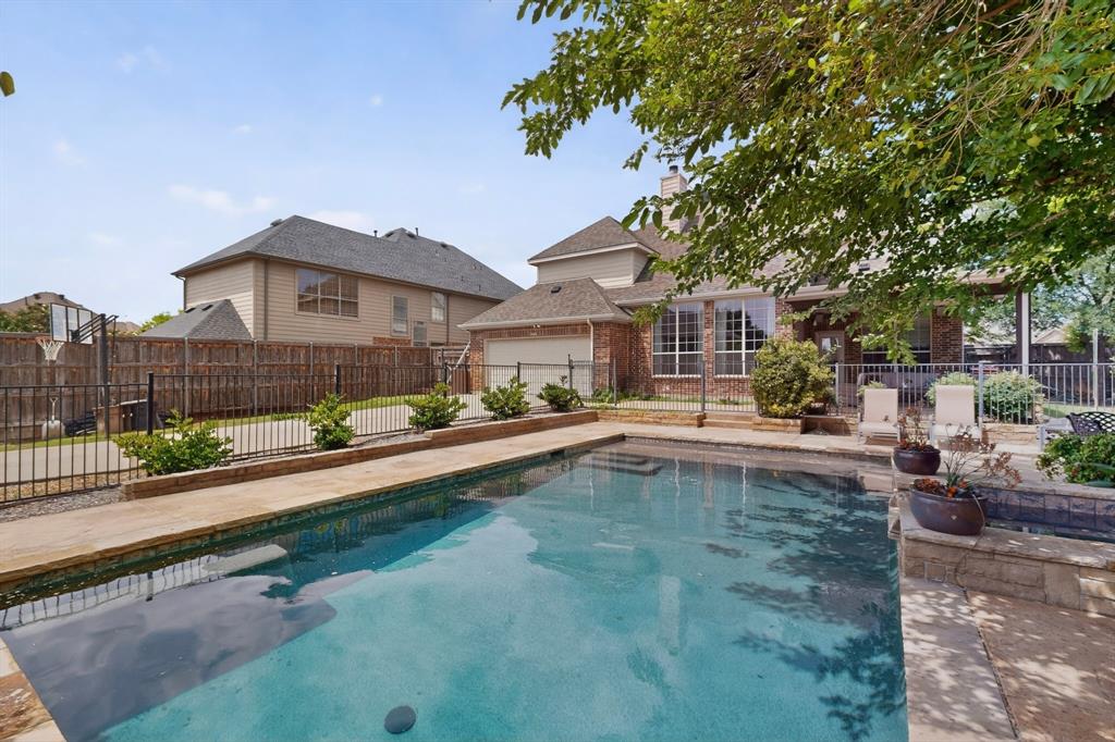 4004 White Porch Road Plano, TX 75024 - Photo 3 of 40 a view of a house with swimming pool and sitting area