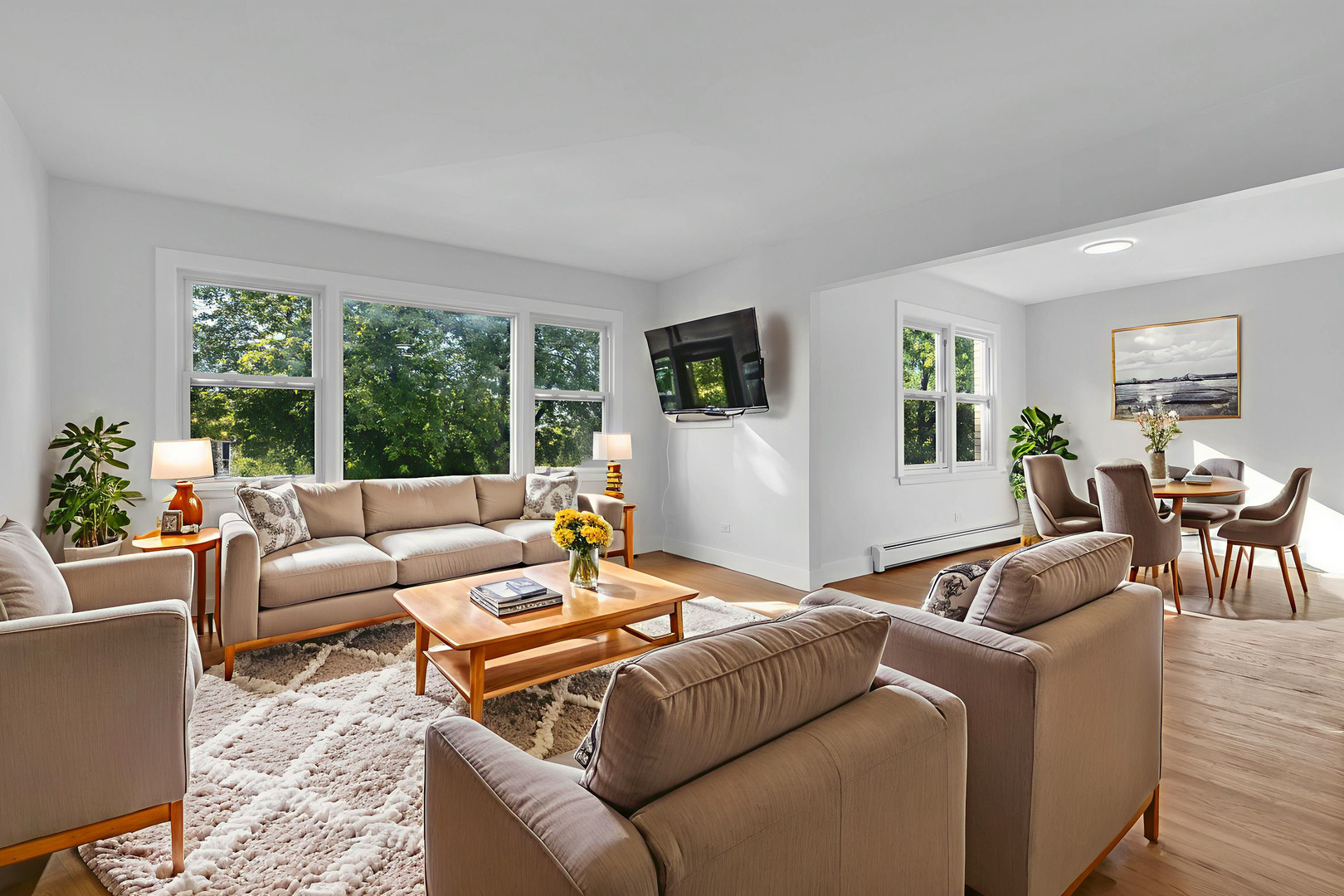 512 Ida Court, Unit 2 Mount Prospect, IL 60056 - Photo 4 of 16 a living room with furniture and a large window