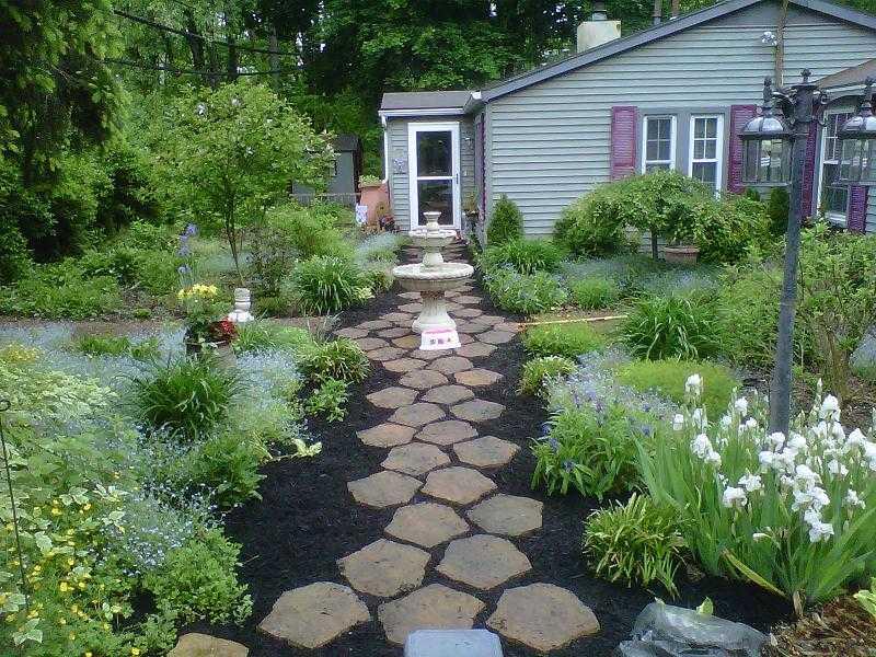 130 Germaine Road Butler, PA 16001 - Photo 2 of 25 Exterior Front. Perenials abound in the lush gardens lovingly arranged around the property.