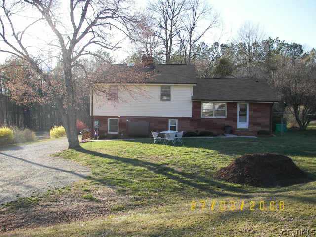 11543 Doswell Road Doswell, VA 23047 - Photo 3 of 8 a view of a house with a yard and a large tree