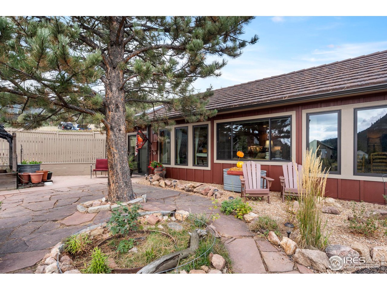 123 Mohawk Road Lyons, CO 80540 - Photo 29 of 35 Patio with Built-in outdoor kitchen, landscaping, and gardening