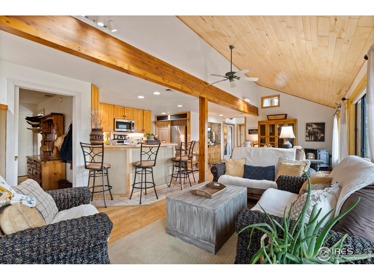 123 Mohawk Road Lyons, CO 80540 - Photo 37 of 38 a living room with furniture and a view of kitchen