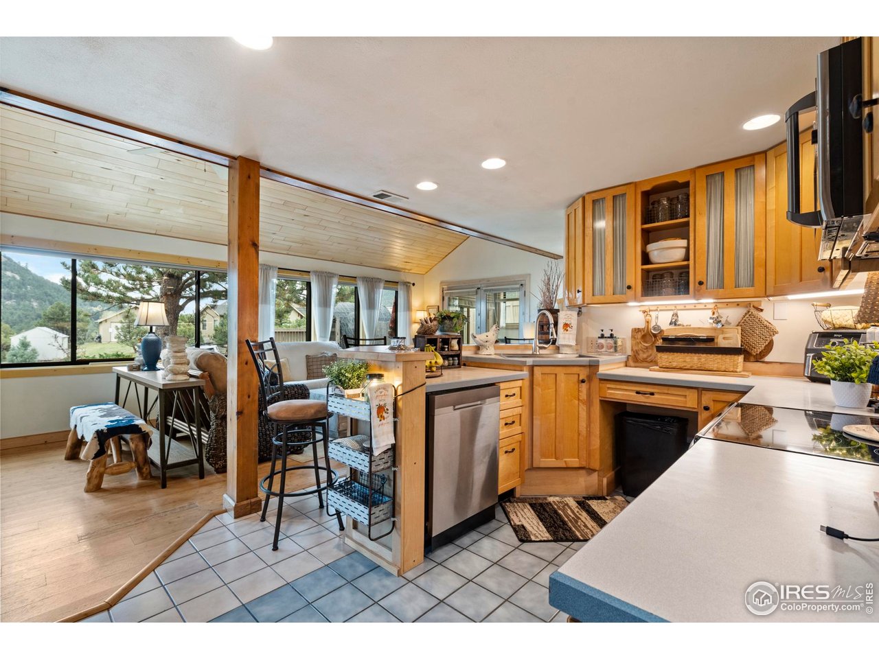 123 Mohawk Road Lyons, CO 80540 - Photo 38 of 38 a kitchen with sink refrigerator and cabinets