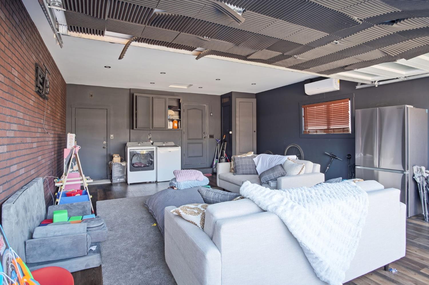 680 Sherri Way Turlock, CA 95382 - Photo 24 of 24 a bedroom with furniture and a fireplace