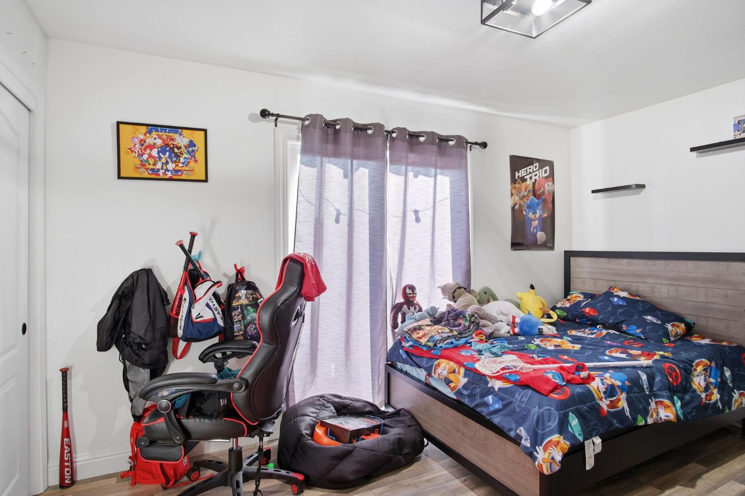 680 Sherri Way Turlock, CA 95382 - Photo 10 of 24 a bed room with furniture and a closet