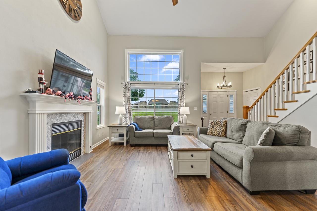 2108 Lake Summerset Road Lake Summerset, IL 61019 - Photo 11 of 53 a living room with furniture and a fireplace